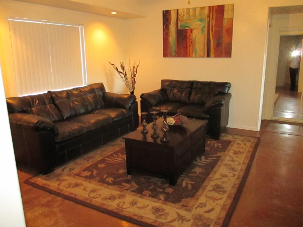 Living room, fabric sofas, wall art